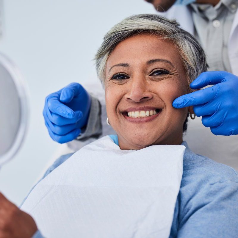 Happy senior woman, teeth and dentist for dental care, appointment or checkup at clinic. Portrait of elderly female person smile for tooth whitening, cleaning or oral, mouth and gum care at hospital Happy senior woman, teeth and dentist for dental care, appointment or checkup at clinic. Portrait of elderly female person smile for tooth whitening, cleaning or oral, mouth and gum care at hospital.